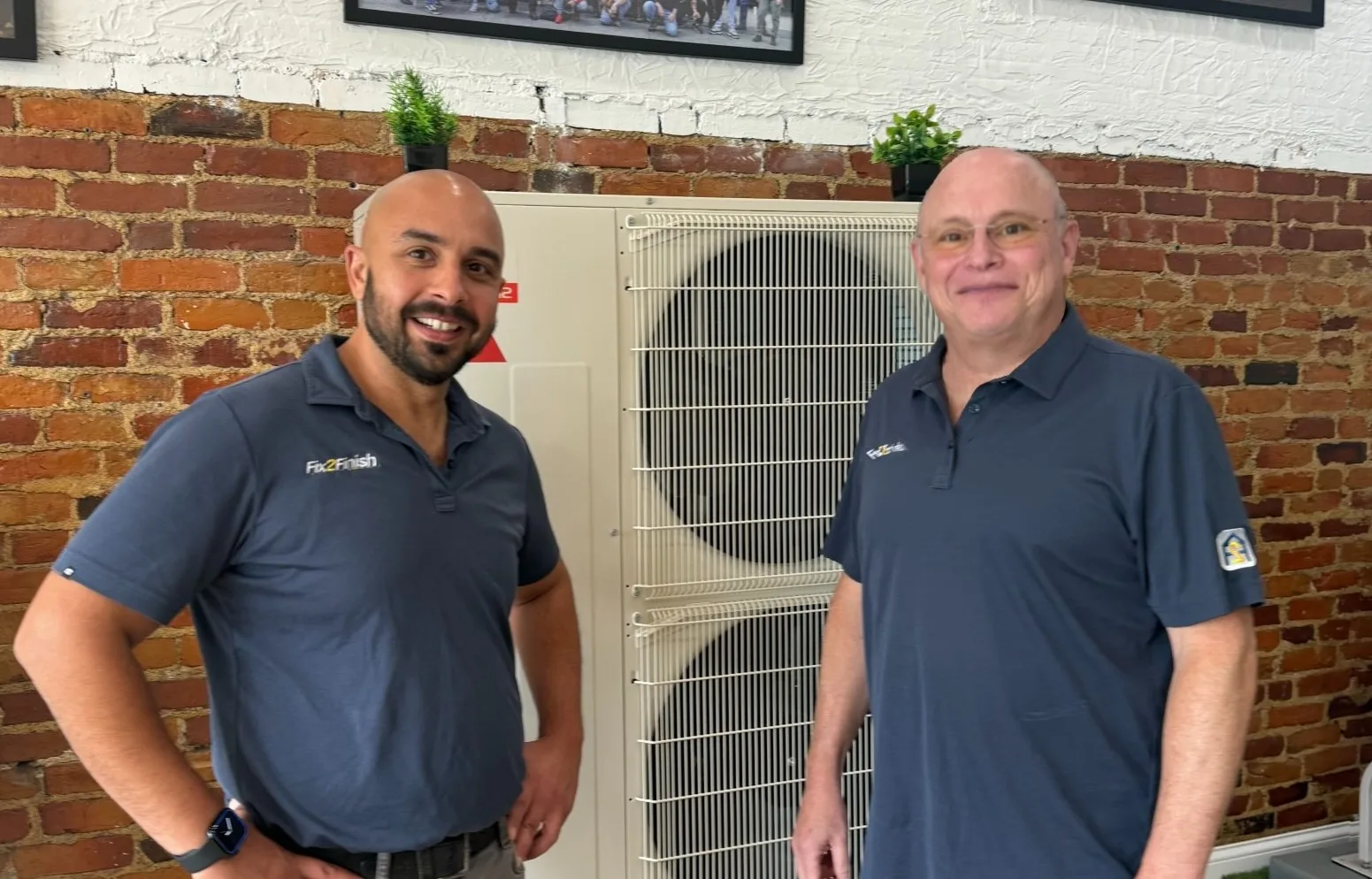 Stephen Akian and Eric Karofsky at an HVAC shop